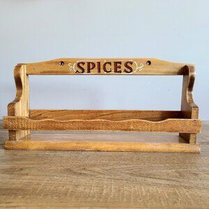 Vintage wooden wall spice rack. Retro kitchen. Rustic cottage core.